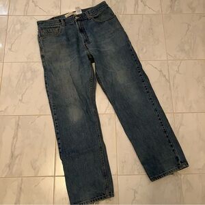 Levis 505 regular fit blue denim jeans. Red tab.  Preloved. Distressed.
